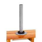 A silver metal post with a circular base flange, shown resting on a wooden slatted surface against a plain white background.