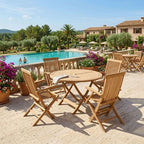 Wooden outdoor furniture set by a pool with a scenic background