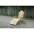 A light natural wood Adirondack-style lounge chair with a matching slatted footrest, placed on a paved patio in front of a bamboo fence.