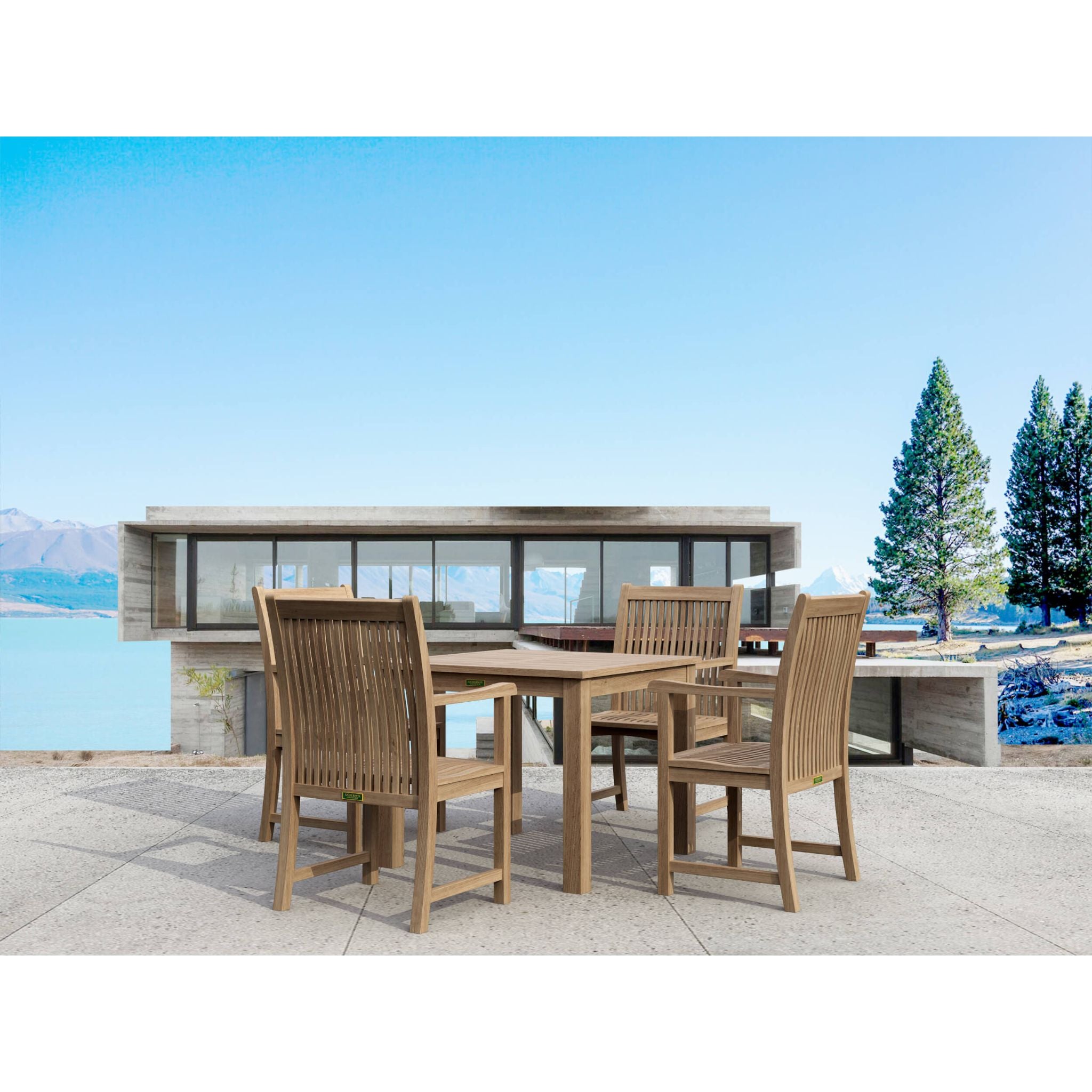 Outdoor dining set with chairs and table on a patio with a scenic background