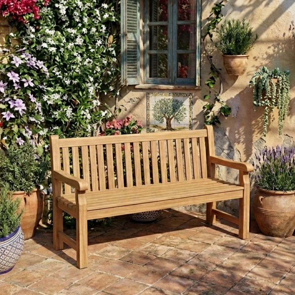 Wooden bench in a garden setting with flowers and plants around