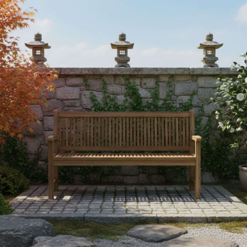 Wooden bench in a garden setting with stone wall and autumn leaves