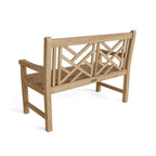 Wooden bench with lattice backrest on a white background