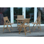 Wooden outdoor furniture set with table and chairs on a wooden deck.