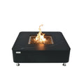A square black outdoor fire pit table with a visible flame, set against a plain white background.