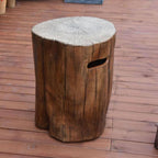Wooden log side table on a wooden deck