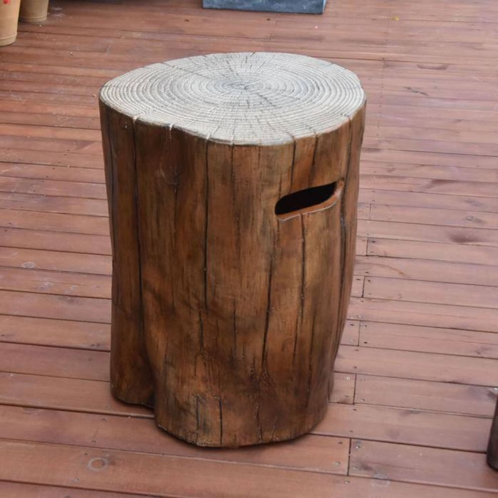 Wooden log side table on a wooden deck