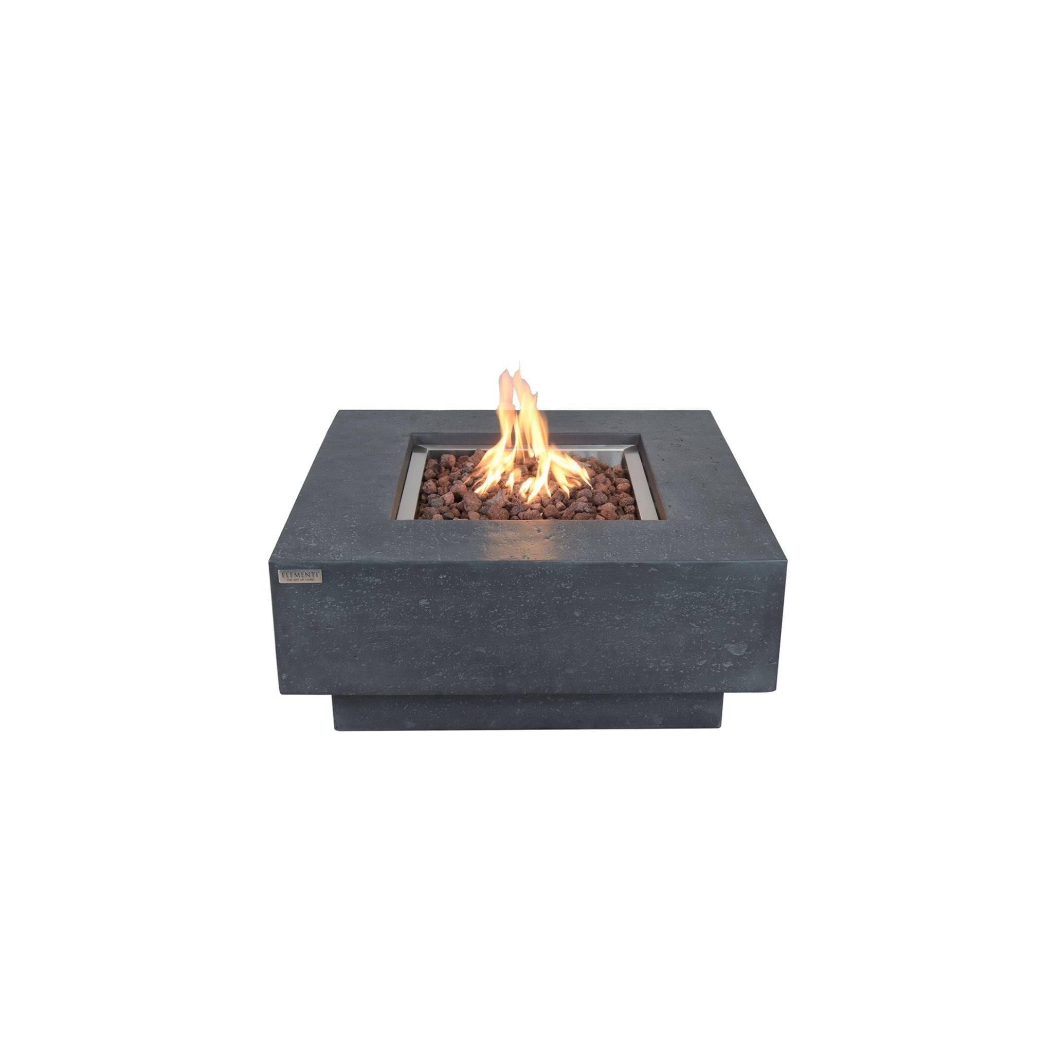 A square outdoor fire pit with a dark gray concrete-look body, filled with brown stones and a visible orange-yellow flame, isolated on a white background.