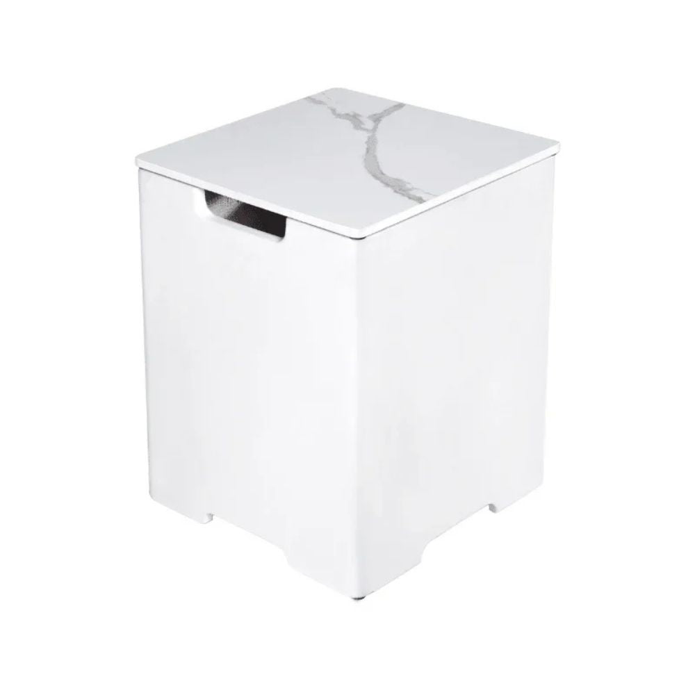 White cube-shaped side table with a marble-patterned top on a white background
