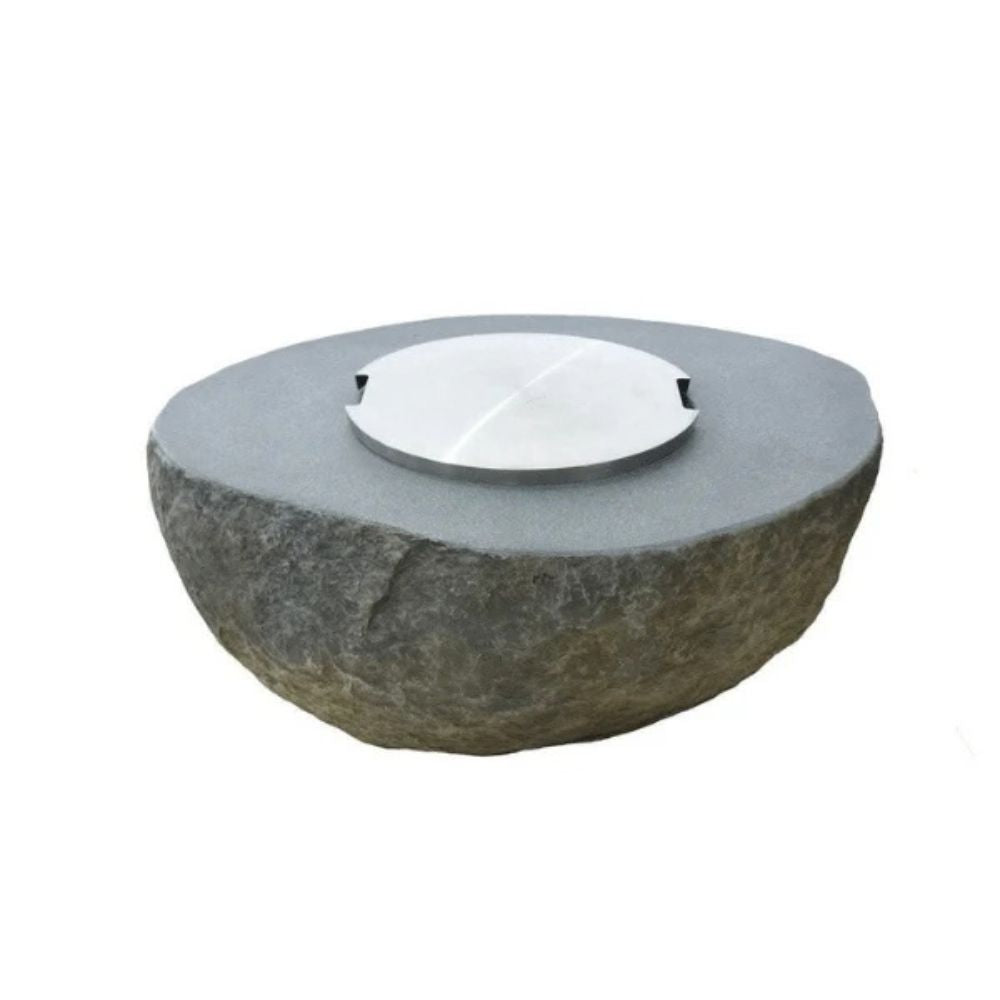 A round stone fire pit with a textured dark gray stone base and a smooth, flat gray top featuring a small silver metal wind guard, shown on a plain white background.