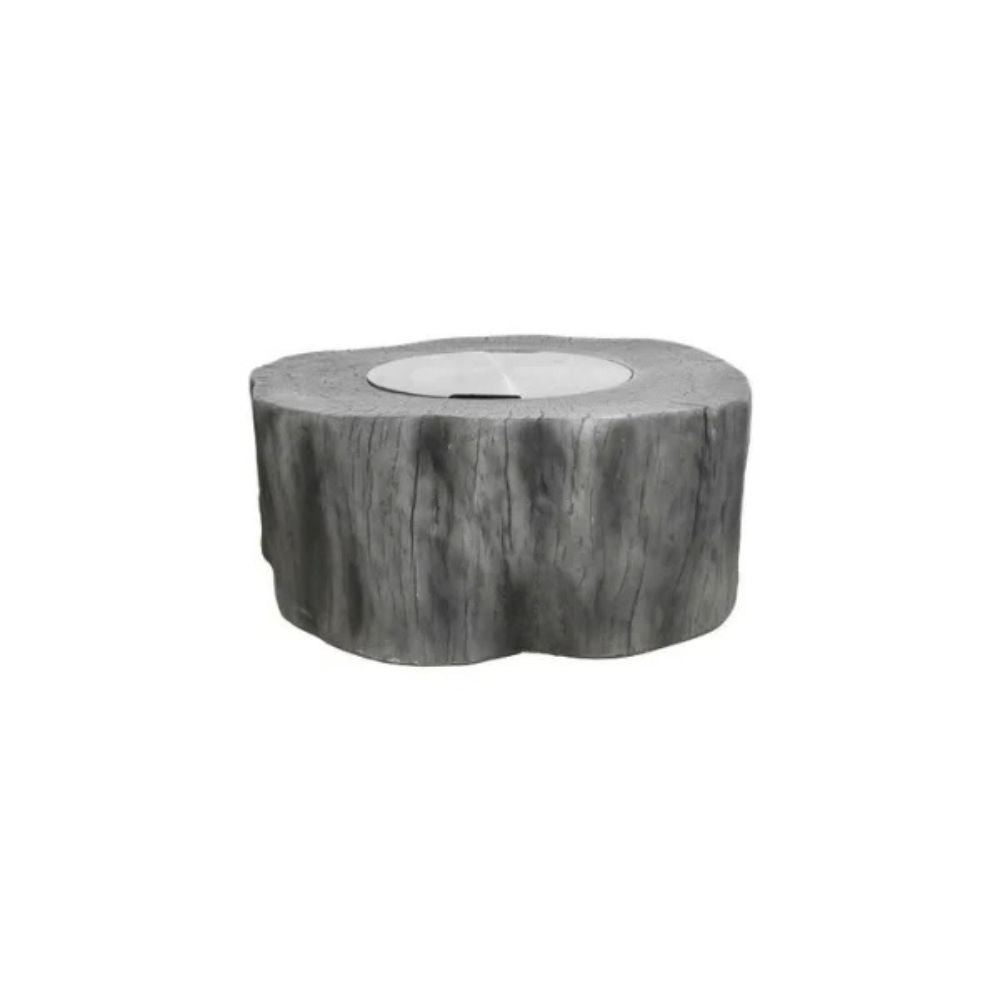 A round, rustic fire pit table designed to look like a weathered tree stump, featuring a textured gray bark pattern and a smooth, light gray circular firebox insert on top, shown against a plain white background.