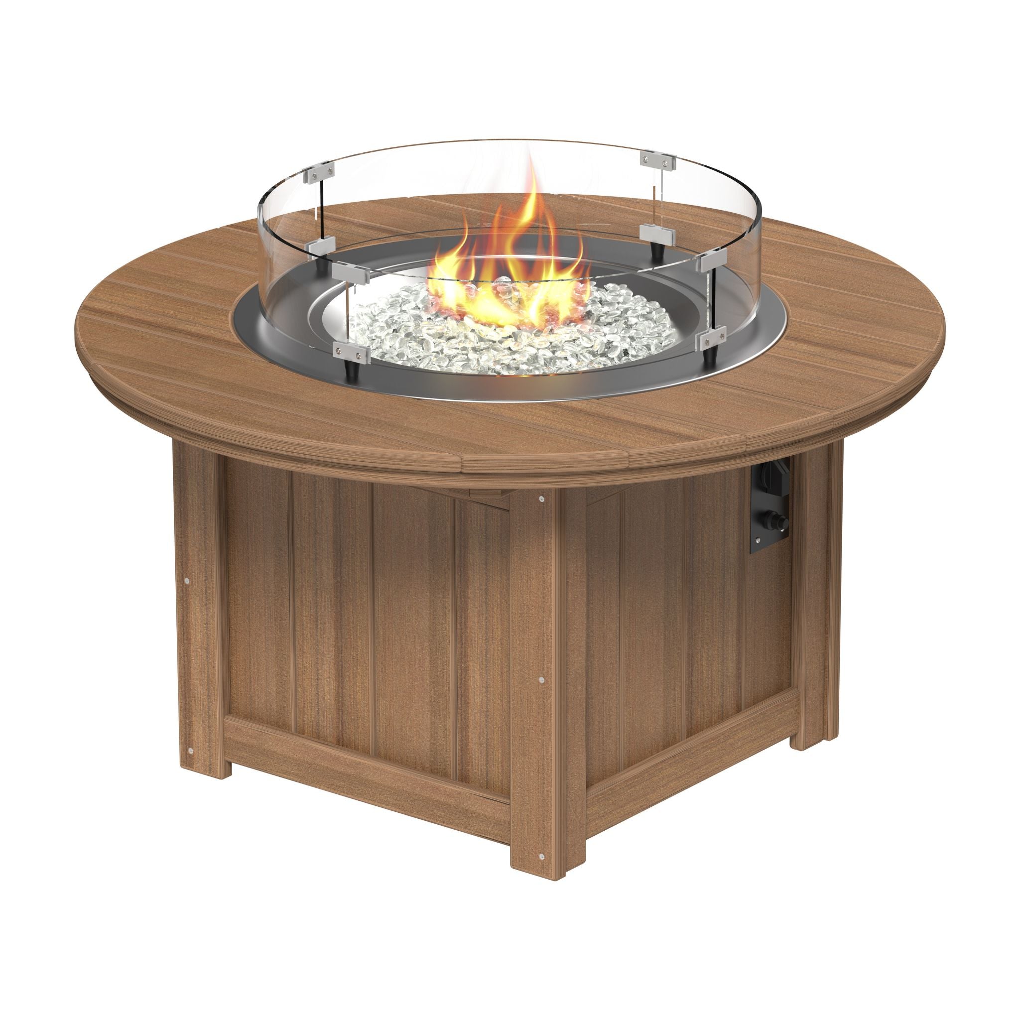 Round outdoor fire pit table with a wood-look finish, clear glass wind guard, and visible flame over white stones, shown on a plain white background.
