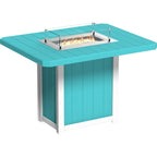 A turquoise and white outdoor fire pit table with a built-in firebox and clear glass wind guard, shown on a solid white background.