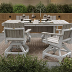 Outdoor dining set featuring a rectangular slatted table and four matching swivel chairs in a light gray finish, arranged on a patterned rug in a patio setting.