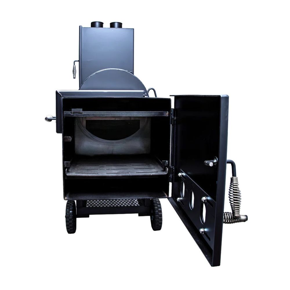 Black metal stove with open door on a white background