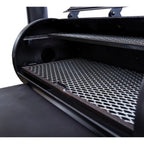 Close-up of a black metal grill with a textured surface