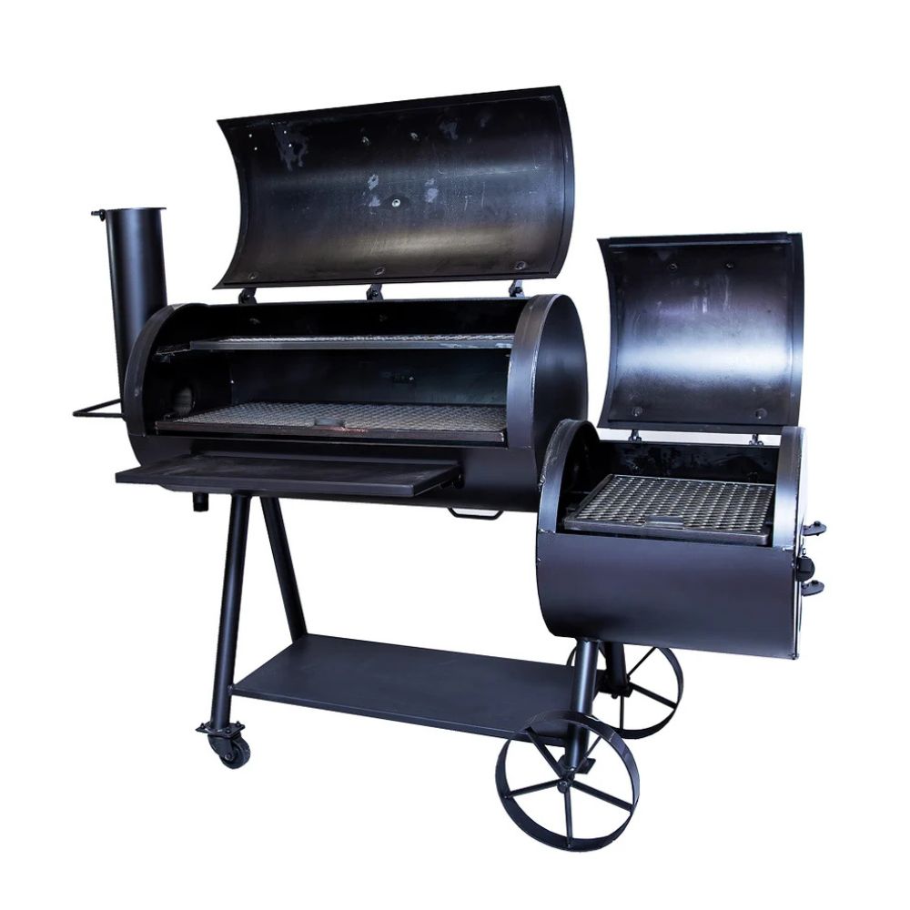 Black barbecue grill with multiple compartments on a white background