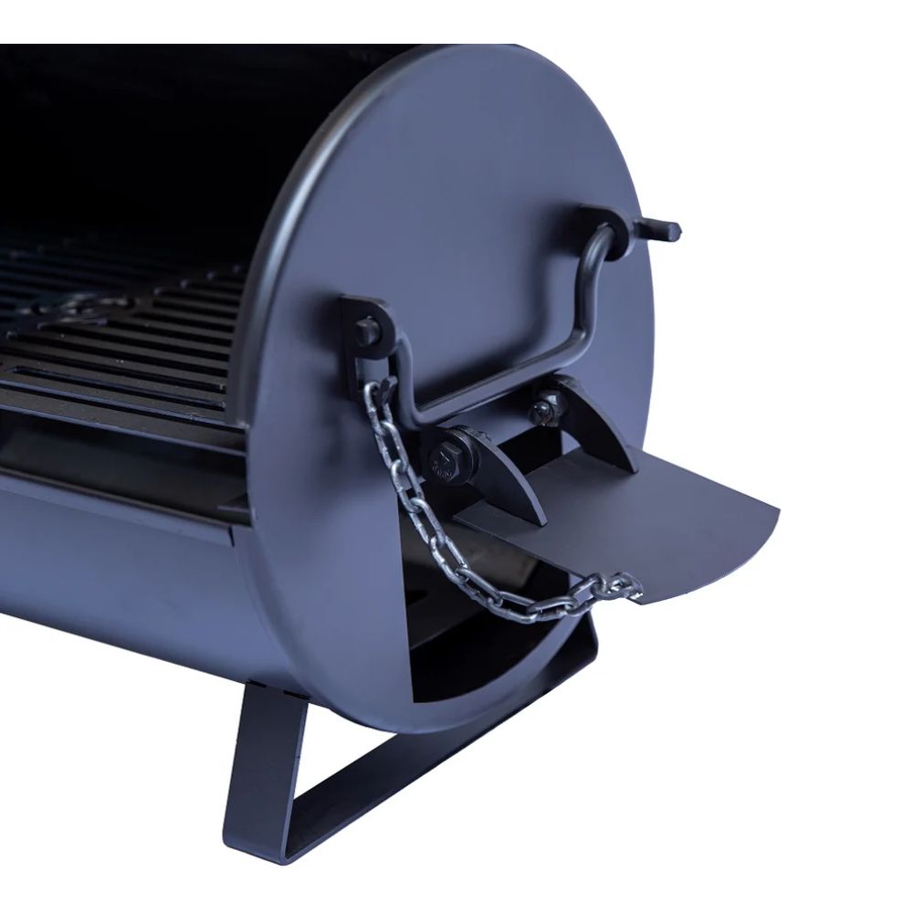 Metallic grill with open lid on a white background