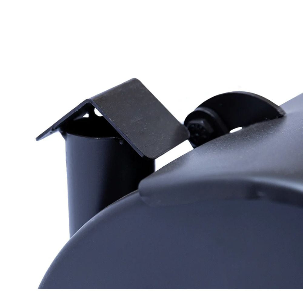 Close-up of a black metal bracket attached to a larger metallic object on a white background