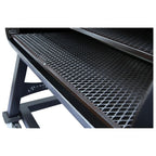 Black metal grill with diamond pattern on a white background