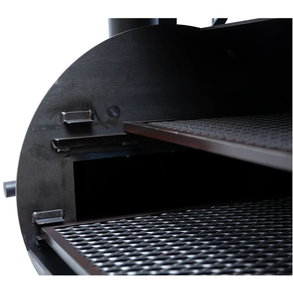 Close-up of a black metal grill with a white background