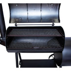 Black barbecue grill with open lid on a white background