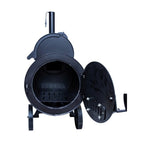 Black metal barbecue grill with open lid on a white background