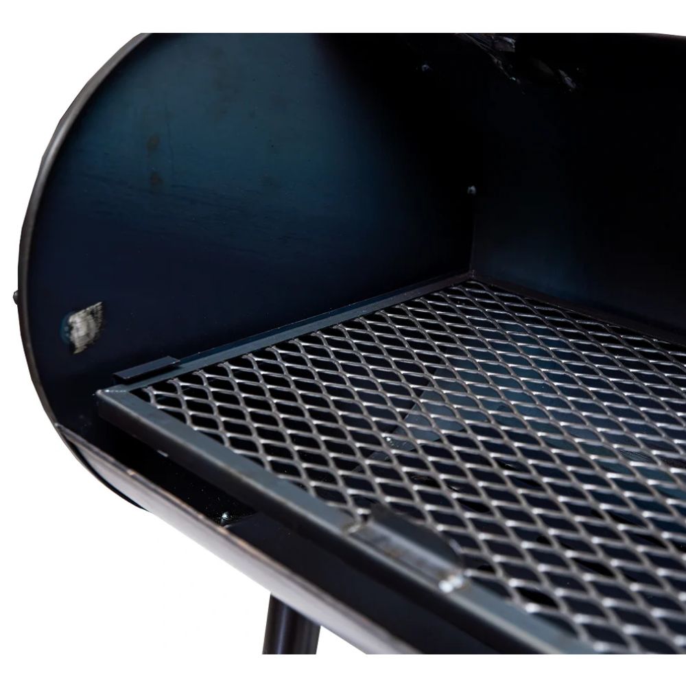 Close-up of a black barbecue grill with a metal grate