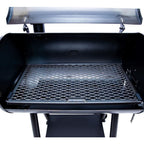 Black barbecue grill with open lid on a white background