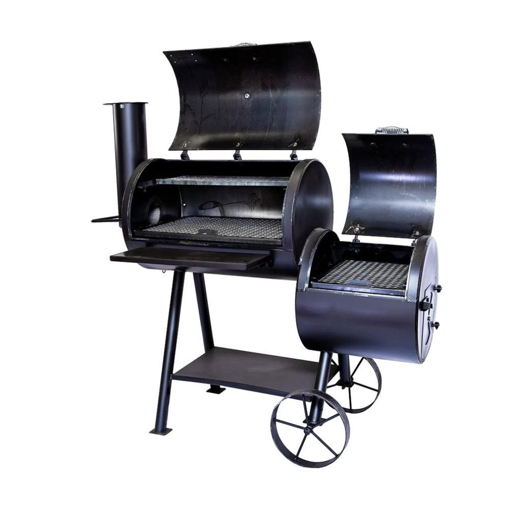 Black barbecue grill with multiple compartments on a white background