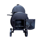 Black metal barbecue grill with open lid on a white background