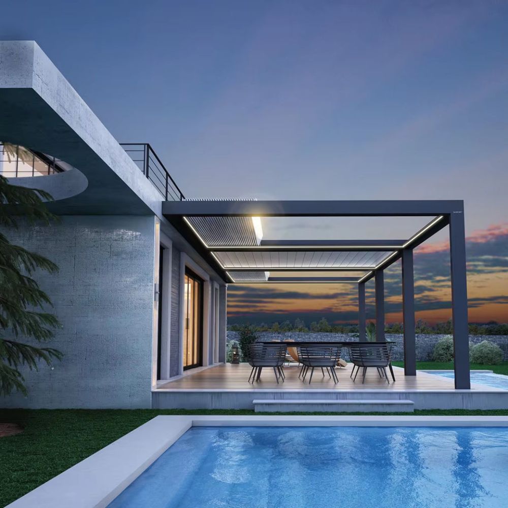 Modern outdoor patio with pool area during sunset