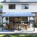 Solar panel on a roof of a house with outdoor furniture underneath