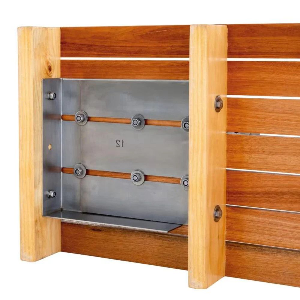 Close-up of a wooden slat fence or barrier with a metal mounting bracket attached to the front, showing light natural wood posts and rails with silver hardware on a white background.