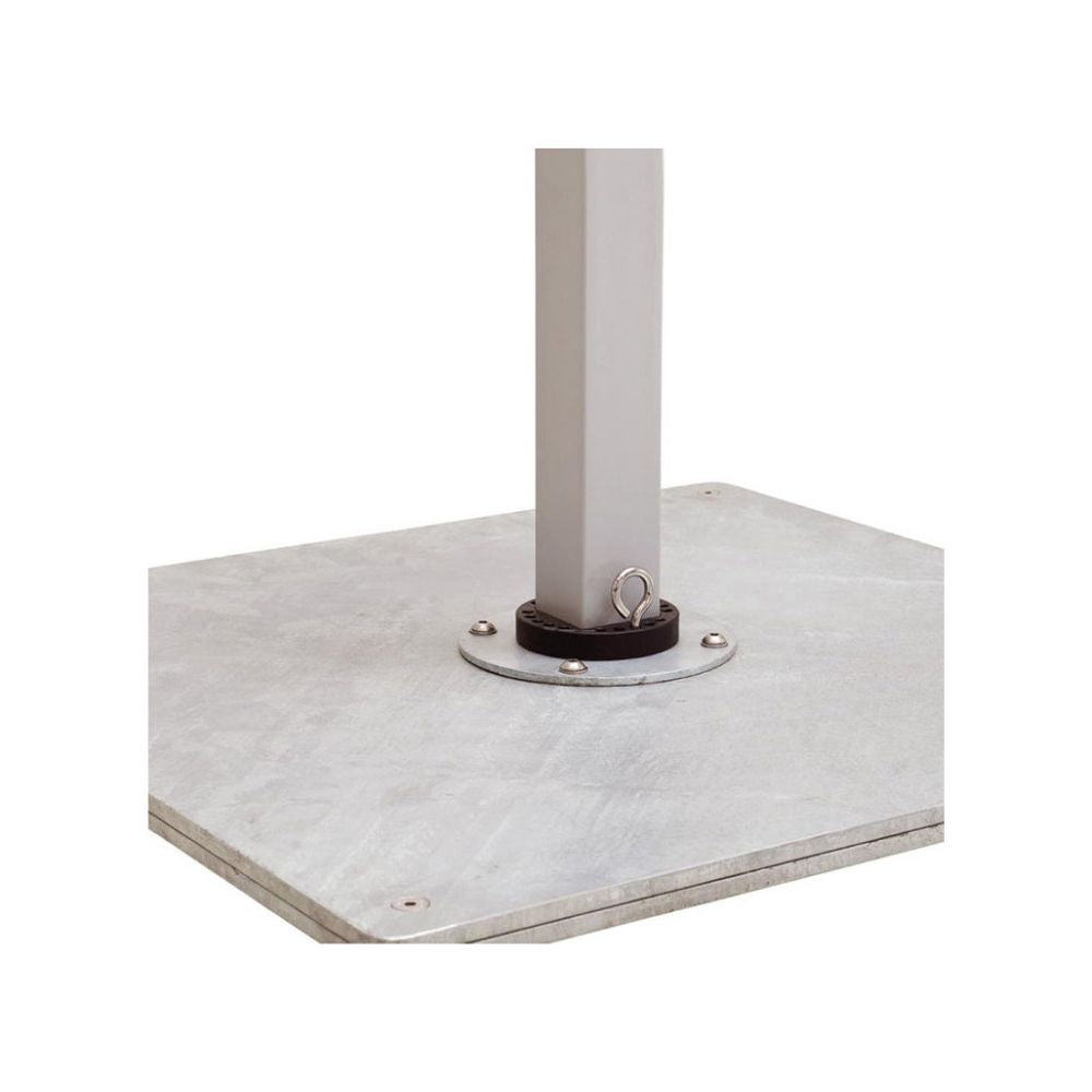 A square metal base plate with a central vertical post, shown on a plain white background. The base has visible screw holes and a textured metallic finish, and the post is secured with a circular flange and a small hanging ring.