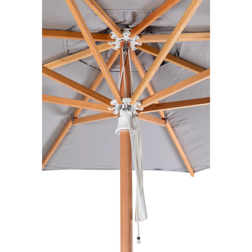 Close-up of an outdoor patio umbrella showing the underside with natural wood ribs, a gray fabric canopy, and a white hanging pull cord on a white background.